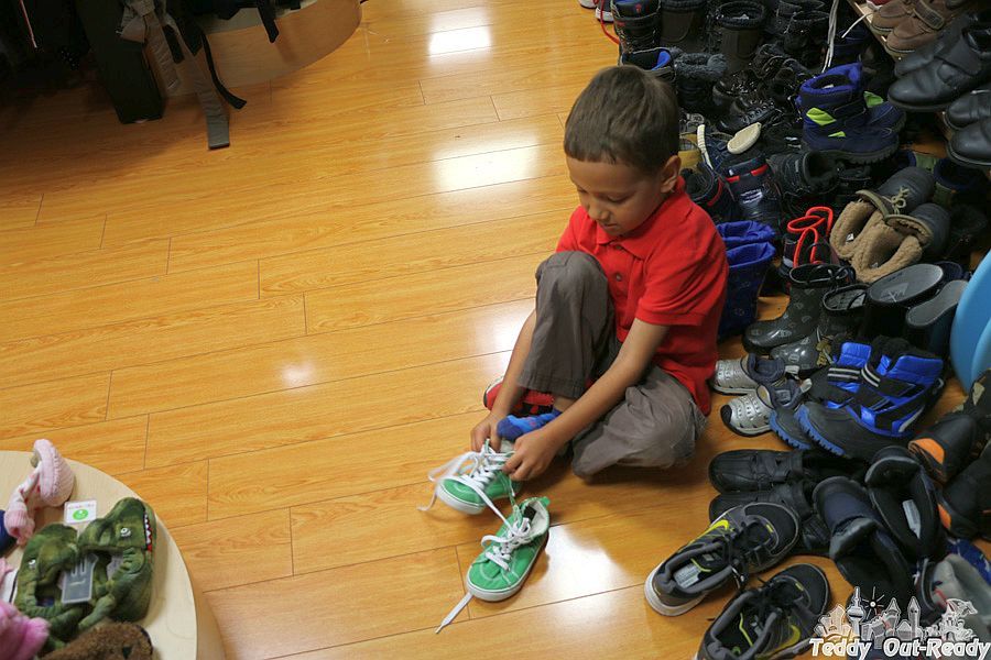 Trying keds at Kid2Kid Store